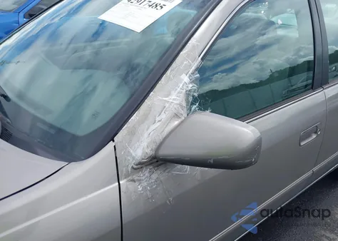 1999 Toyota Camry Le z USA, uszkodzony, nr VIN 4T1BG22K5XU523267